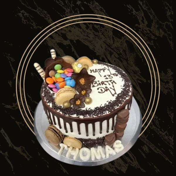 Layered birthday cake filled with colorful confetti and buttercream from The Bakers Shop in Birmingham