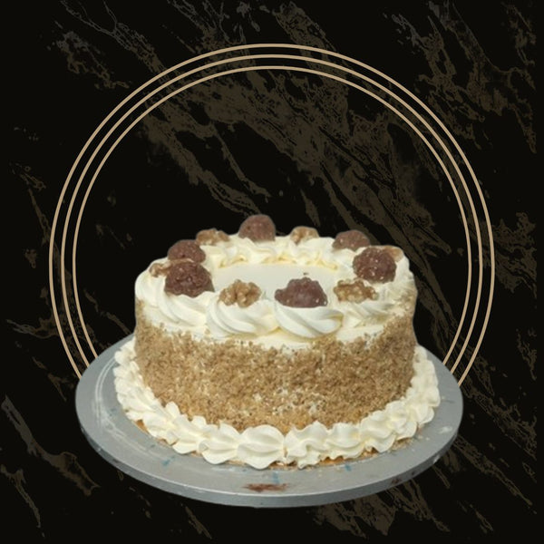 Mini carrot cake with rich layers and walnut garnish from The Bakers Shop in Birmingham