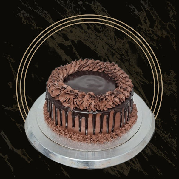 Chocolate truffle-style cake with dense, rich texture from The Bakers Shop in Birmingham