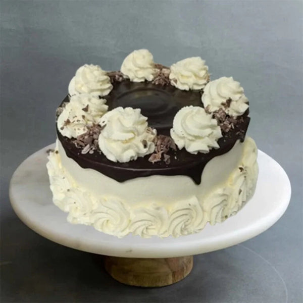 Fancy custom birthday cake with pink frosting from The Bakers Shop in birmingham