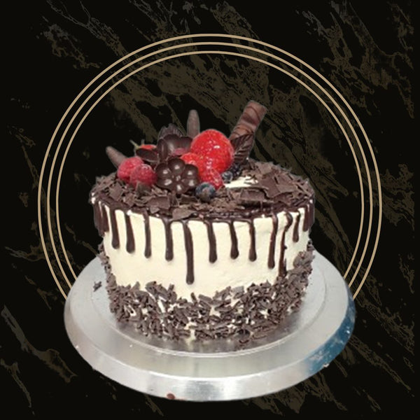 Luxury design fancy cake with gold accents and smooth finish from The Bakers Shop in Birmingham