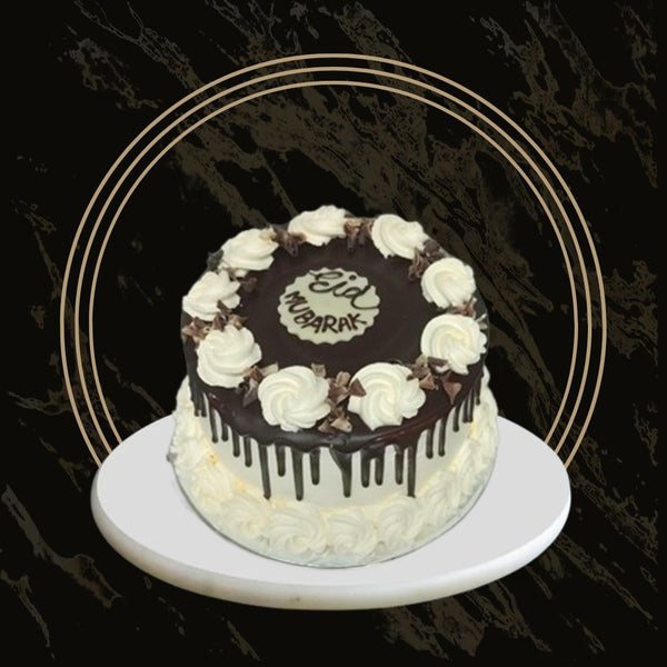 Traditional Fancy Eid cake with classic Eid symbols and delicate decoration from The Bakers Shop in Birmingham