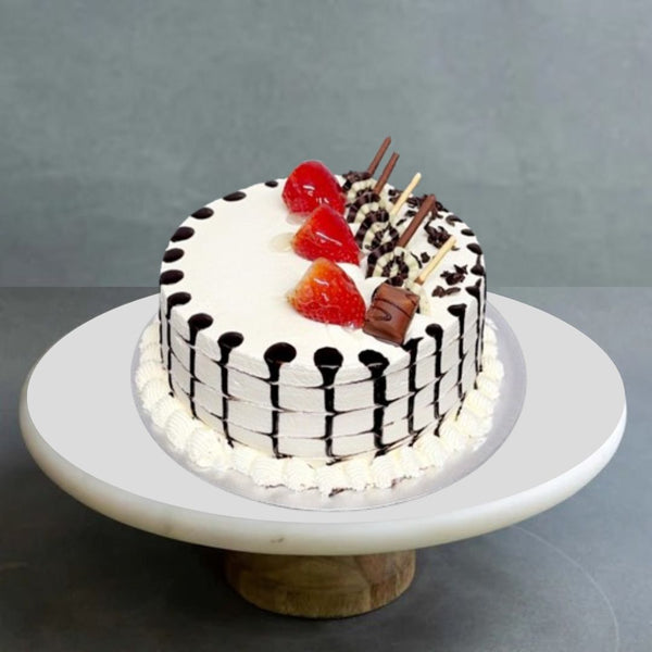 Elegant Fancy Mother’s Day cake with pastel colors and floral decorations from The Bakers Shop in birmingham.