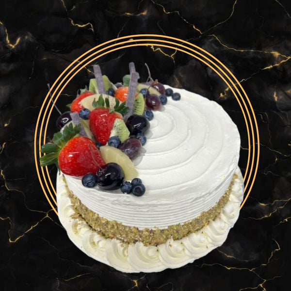 Fresh Fruit Celebration Cake topped with strawberries, blueberries, grapes, and kiwi – The Bakers Shop Birmingham