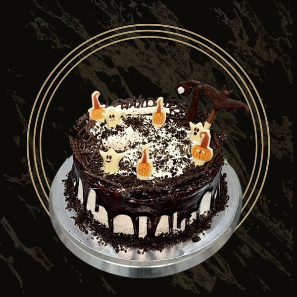 Haunted Delight Halloween cake with dark chocolate drip, tombstone toppers, and eerie frosting from 彩票联盟123赛车赛车官方网站 in Birmingham