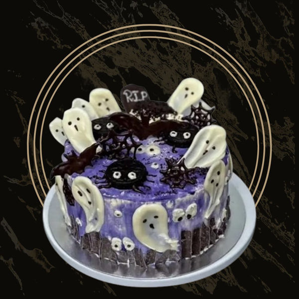 Dark chocolate Haunted Delight cake with spooky tree design and ghostly decorations from 彩票联盟123赛车赛车官方网站 in Birmingham