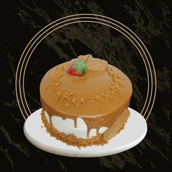 Lotus cake with caramel Biscoff drip and decorative biscuits from The Bakers Shop in Birmingham