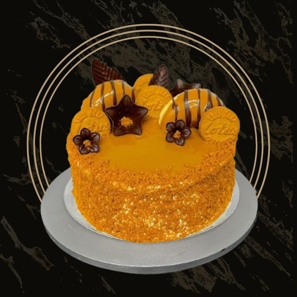 Slice of Lotus Biscoff cake with smooth layers and rich filling from The Bakers Shop in Birmingham