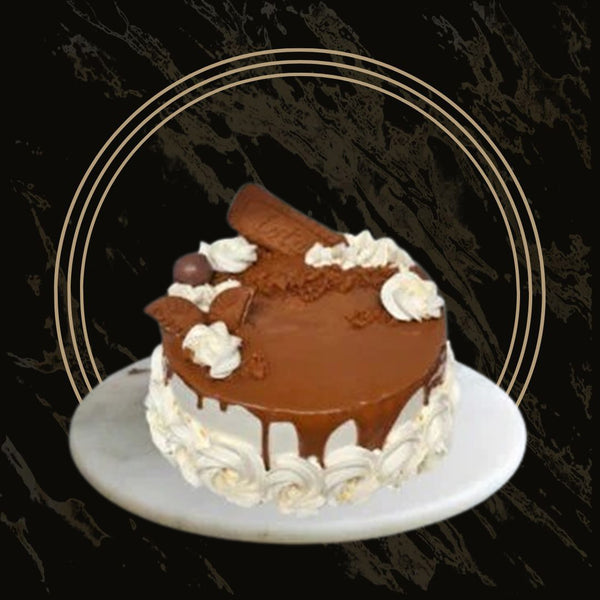 Tall Lotus Biscoff cake with rich layered filling and smooth frosting from The Bakers Shop in Birmingham