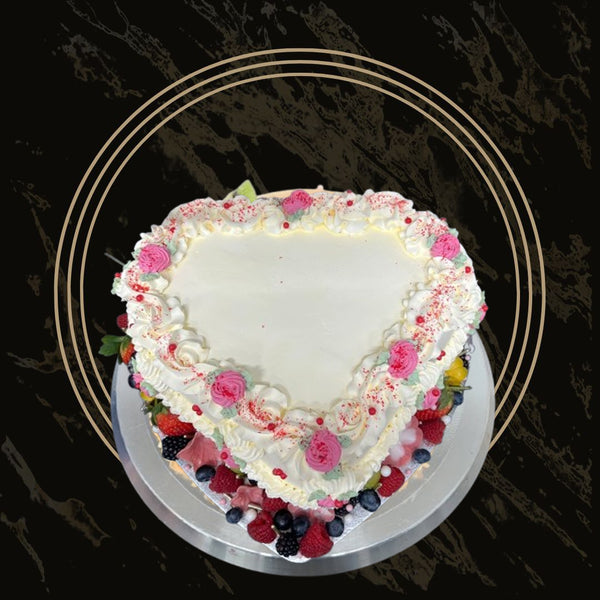 Romantic Berry Bliss cake with fresh berries, cream layers, and delicate pink frosting from The Bakers Shop in Birmingham