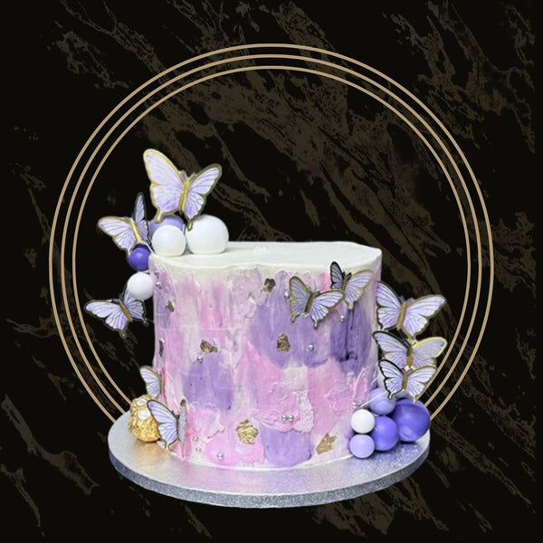 Elegant tiered wedding cake with floral decorations and smooth fondant finish from 彩票联盟123赛车赛车官方网站 in Birmingham